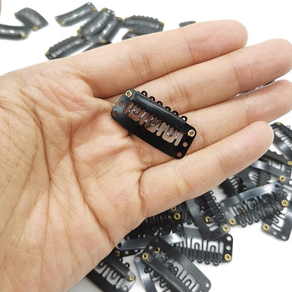 a person holding a remote control in their hand 